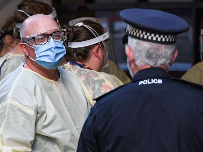 Medical staff and police prepare to test all the returned travellers for Covid-19 at Peppers Hotel in Weymouth St, Tuesday November 24, 2020. Pic: Brenton Edwards