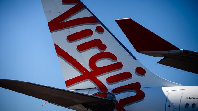 Virgin Australia aircraft seen parked on the tarmac at Brisbane International airport. Picture: AFP