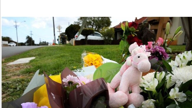 Tributes outside the victims’ property in Coode St, Bedford, Perth on Tuesday. AAP Image/Richard Wainwright