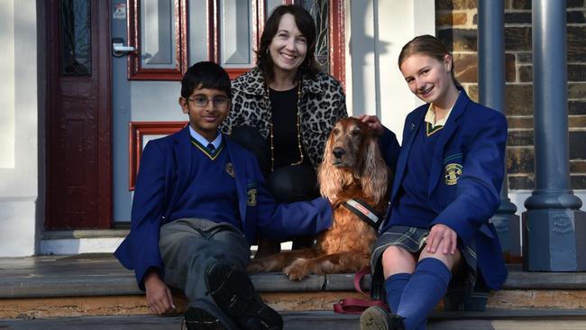 Pembroke students with the school’s dean of student wellbeing Rebecca Forrest and Ned the wellbeing dog. Picture: Supplied