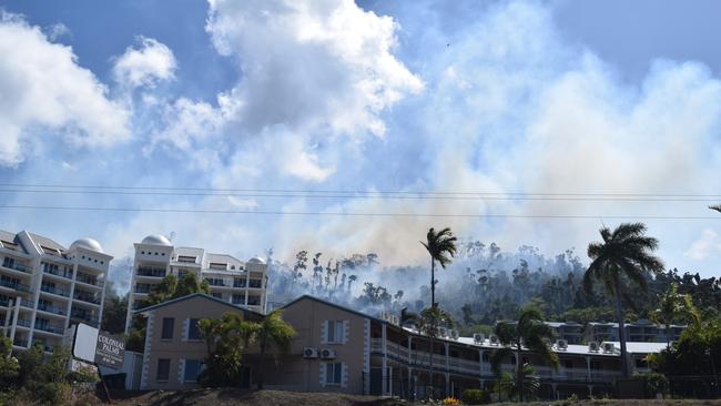 A vegetation fire broke out on Mount Whitsunday Rd in Airlie Beach on Monday. Picture: Elyse Wurm