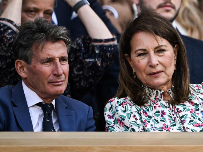 World Atheltics President Sebastian Coe (L) speaks with Carole Middleton as they attend Wimbledon. Picture: AFP