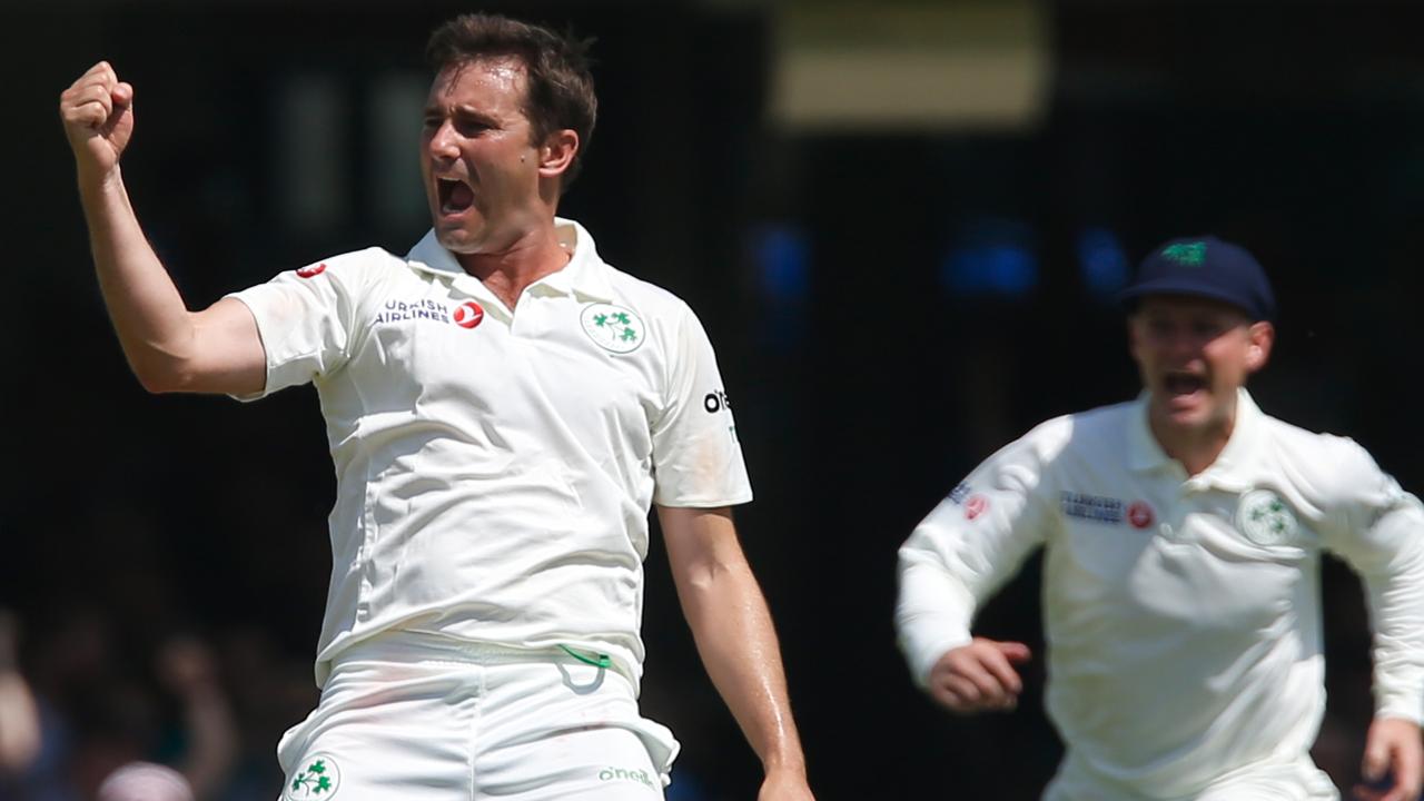 Ireland's Tim Murtagh celebrates taking the wicket of England's Chris Woakes.