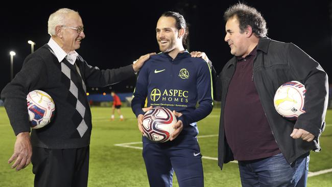 Adelaide Olympic captain Ricardo Da Silva with players from the club’s inaugural team, Chris Tertipis (left) and Chris Despotakis. Picture: Dean Martin