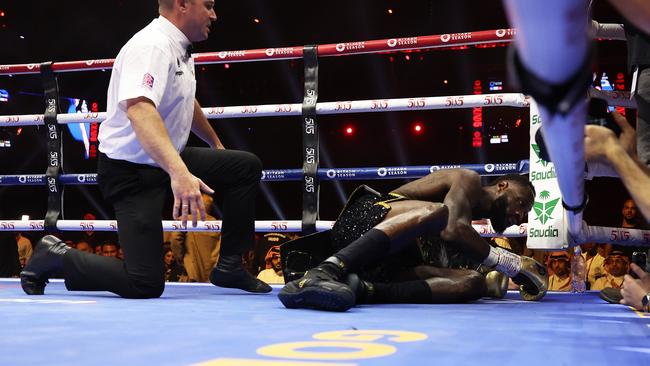 Deontay Wilder tied to get back to his feet. Photo by Richard Pelham/Getty Images.