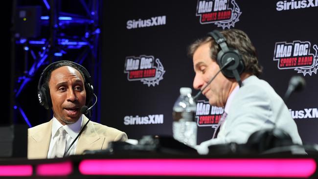 Smith with colleague Chris Russo during Super Bowl LVIII in February. (Photo by Cindy Ord/Getty Images for SiriusXM)