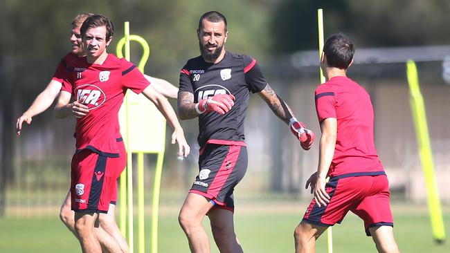 Adelaide United’s Craig Goodwin and Paul Izzo at training on Thursday. Picture: AAP Image/Dean Martin