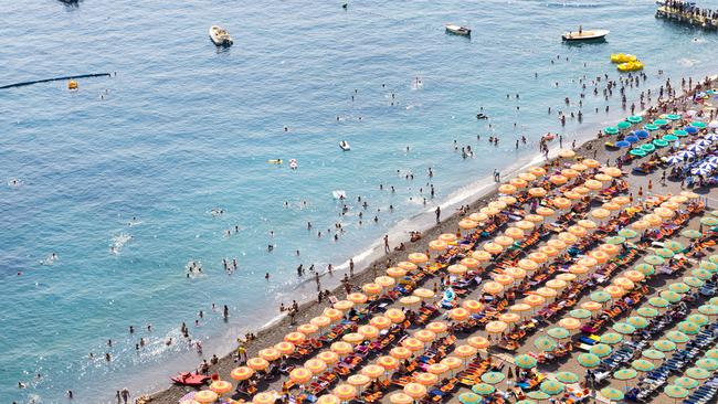 Peak Summer: Beach property is at a premium in Positano on Italy's Amalfi Coast each summer. Picture: Getty