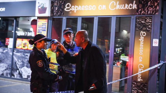 A man arguing with the police outside the evacuating Mascot Towers. Picture: Daily Telegraph-Flavio Brancaleone