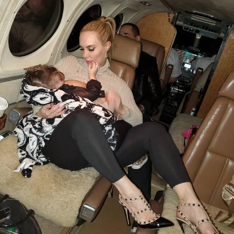 Coco Austin breastfeeds her child.