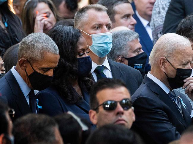 US President Joe Biden with former President Barack Obama stands with former First Lady Michelle Obama as they attend the ceremony at the National 9/11 Memorial. Picture: AFP