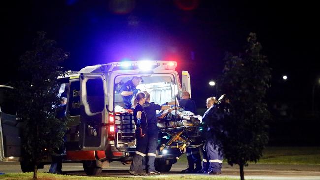 Paramedics load Shannan Rushworth into an ambulance following a violent affray at Panthers McDonald’s last February. Dean Hooper was today sentenced for his role in the incident. Picture: Steve Tyson