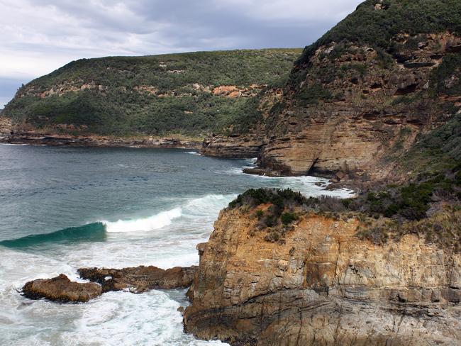 surf near Remarkable Cave, Tasman Peninsula. by Kane Young