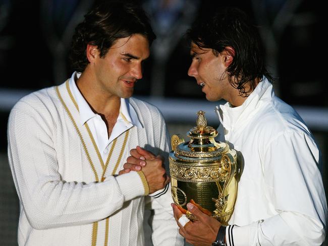 Roger Federer congratulates Rafael Nadal after an epic battle at Wimbledon in 2008. Picture: Julian Finney/Getty Images