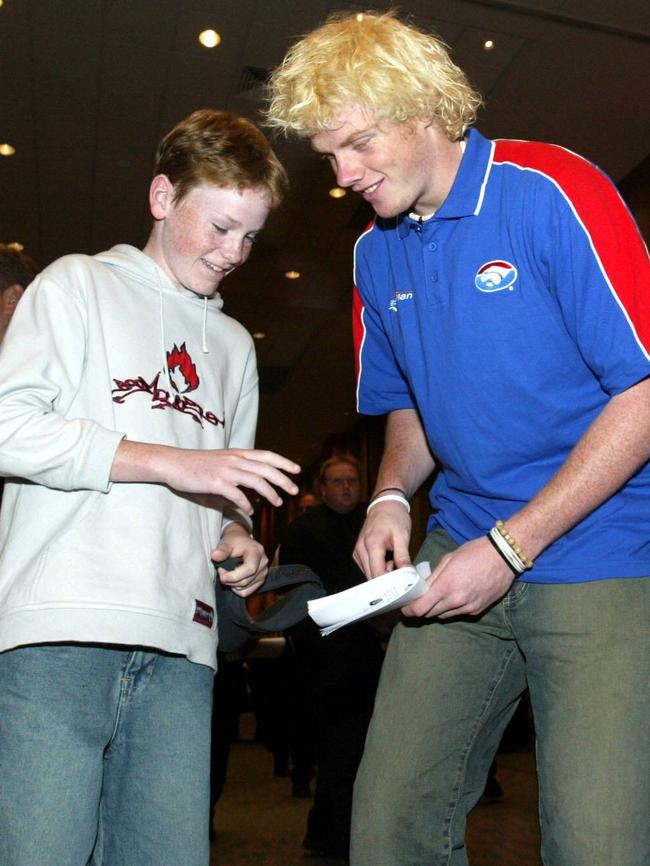 No. 1 draft pick Adam Cooney signs his first autograph.