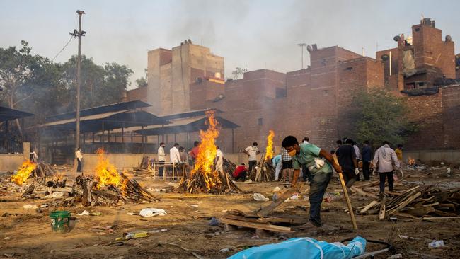 A funeral pyre is prepared for a Covid-19 victim in New Delhi on Thursday. Picture: Reuters