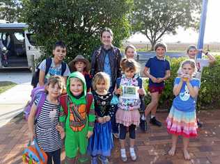 Year 10 student Megan with students at Durong South State School. Picture: Murgon State High School