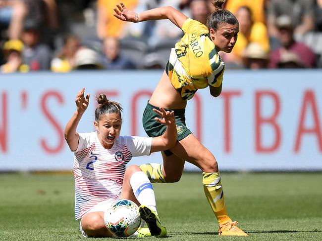 Chile’s Rocio Soto tackles Matildas star Chloe Logarzo. Picture: AAP