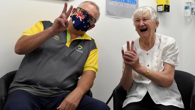 Scott Morrison and aged-care resident Jane Malysiak after receiving their second and final COVID-19 vaccination shot at the Castle Hill Medical Centre in Sydney on Sunday. Picture: Bianca De Marchi