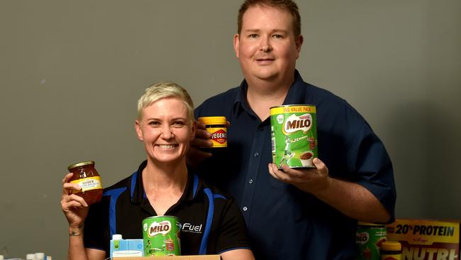 Paula Pool and trent Nolan from the Rotary Club of Townsville Inc with supplies for Fuel for Schools. Picture: Evan Morgan