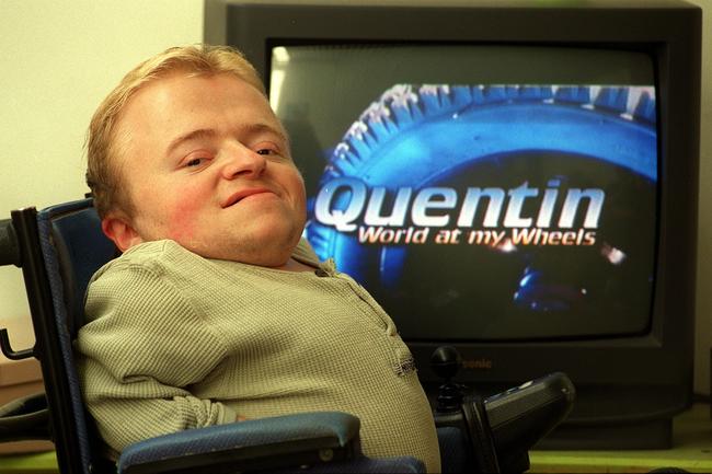 Quentin Kenihan at his Adelaide home in 2000 commenting on soon-to-air documentary “Quentin : World at My Wheels”. Picture: Chris Crerar.