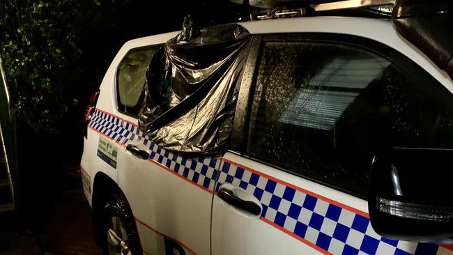 A police vehicle was allegedly damaged when the man was taken into police custody. Picture: Rae Wilson and Tara Miko