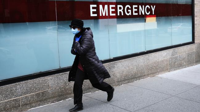 A woman walks by the emergency entrance to Mount Sinai Hospital in New York. Picture: Spencer Platt/Getty Images