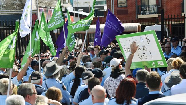 Public Service Association members rally at Parliament House in September last year over plans to privatise management of the Adelaide Remand Centre. Picture: AAP / David Mariuz