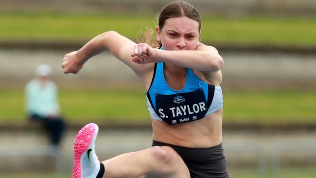 Savannah Taylor of Endeavour Sports High School was a picture of concentration in the 14 years girls 90m hurdles.