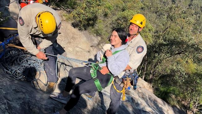 Sarah Wylie being rescued from Mt Tibrogargan after her disastrous first date. (Pic: Supplied)