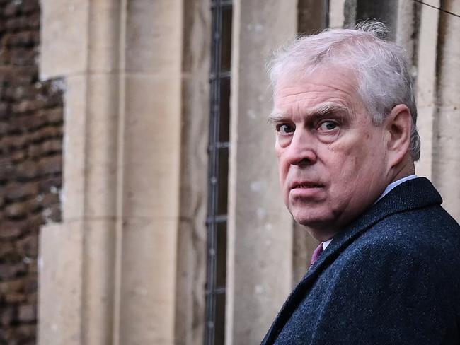 Britain's Prince Andrew, Duke of York reacts as he arrives for the Royal Family's traditional Christmas Day service. Picture: AFP