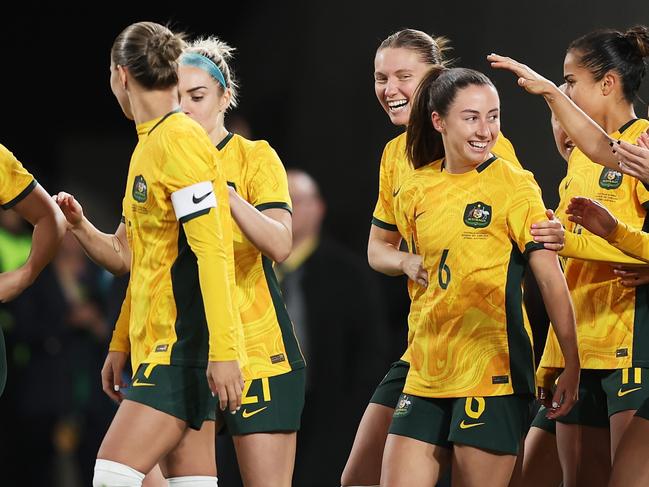 SYDNEY, AUSTRALIA - JUNE 03:  Clare Wheeler of Australia celebrates with team mates after scoring a goal during the international friendly match between Australia Matildas and China PR at Accor Stadium on June 03, 2024 in Sydney, Australia. (Photo by Matt King/Getty Images)