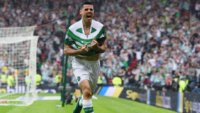 Tom Rogic celebrates his winning goal.