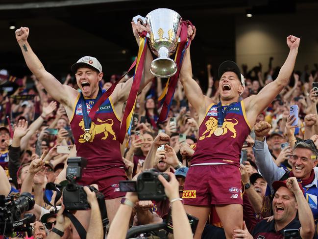 Neale and Dayne Zorko get the celebrations into full swing. Picture: David Caird