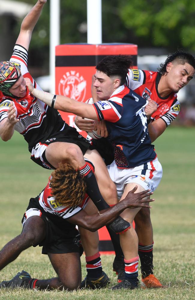 Aaron Payne Cup clash between Kirwan High Bears and St Patrick's College at Kirwan. Bears Harley Taylor, Dudley Dotai and Mia Pua'avase try and stop St Patrick's Bailey Jeffs. Picture: Evan Morgan