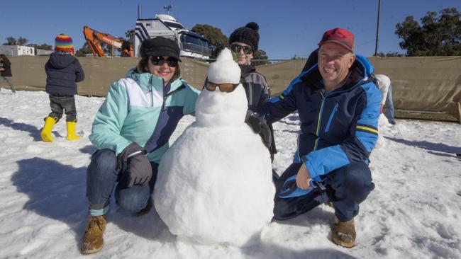 Guide to day two of Snowflakes in Stanthorpe. Pictured: Jayne, Mike and Josh Lawlor from the Sunshine Coast at Snowflakes in Stanthorpe. Photo: Liana Turner / NRM Staff