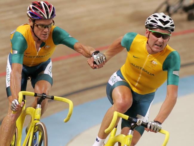 Stuart O'Grady and Graeme Brown, right, on their way to gold in Athens. Photo: Phil Hillyard.