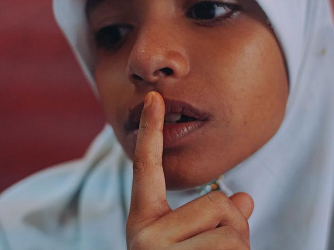 Sabu Kunahar, 10, speaks about her village in Myanmar which she left just months ago. She is now living in Malaysia. Picture: Rahman Roslan/Getty Images