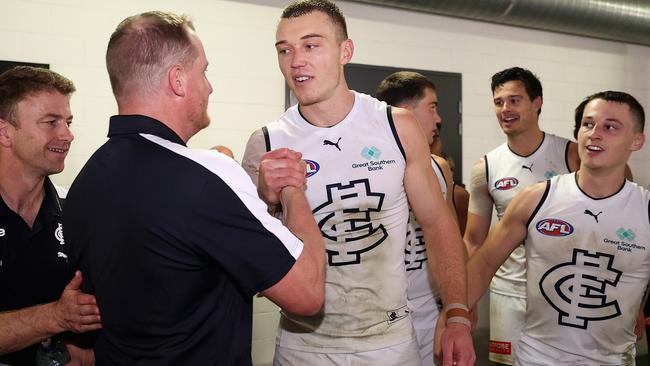 Coach Michael Voss congratulates Patrick Cripps after wining their first game ever at Giants Stadium. Picture: Cameron Spencer/AFL Photos/via Getty Images