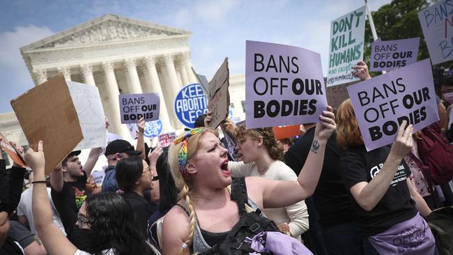 Pro-choice and anti-abortion activists confront one another in front of the US Supreme Court Building. Picture: AFP.