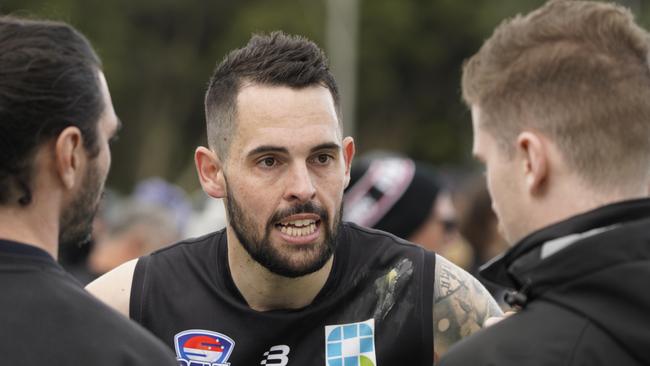 Southern league Division 4 footy grand final: Frankston Dolphins v Lyndhurst. Frankston coach Richard Mathers addressing players. Picture: Valeriu Campan