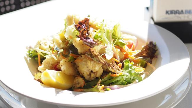 Calamari with a tossed salad and house dressing at Kirra Beach Hotel.