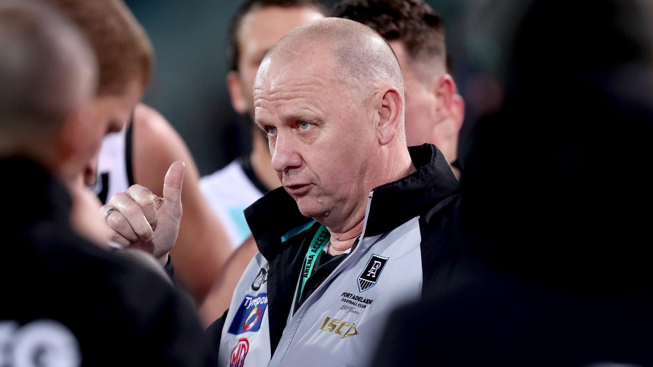 Ken Hinkley addresses his players. Photo: James Elsby/AFL Photos via Getty Images.