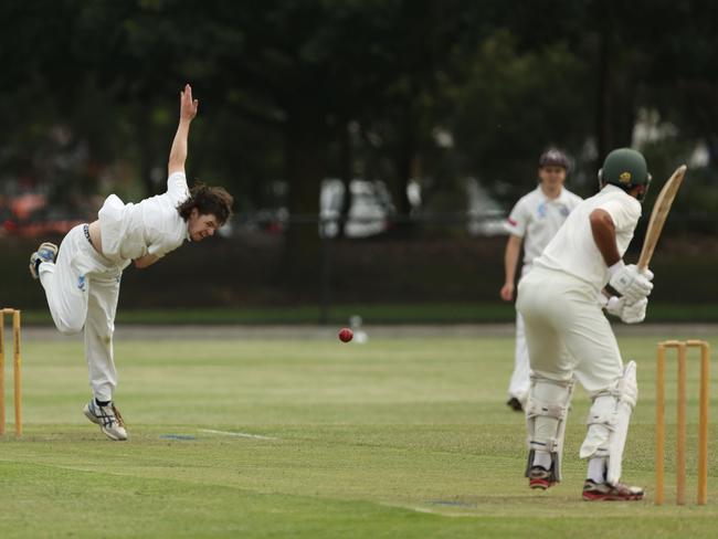 Elsternwick bowler Jacob Kerr bends his back against Croydon.