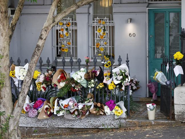 Floral tributes for Jesse Baird and Luke Davies at their home on Brown Street in Paddington. Picture: Richard Dobson