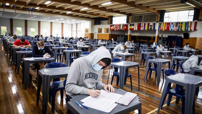 VCE students sitting exams with masks on. Picture- Nicole Cleary