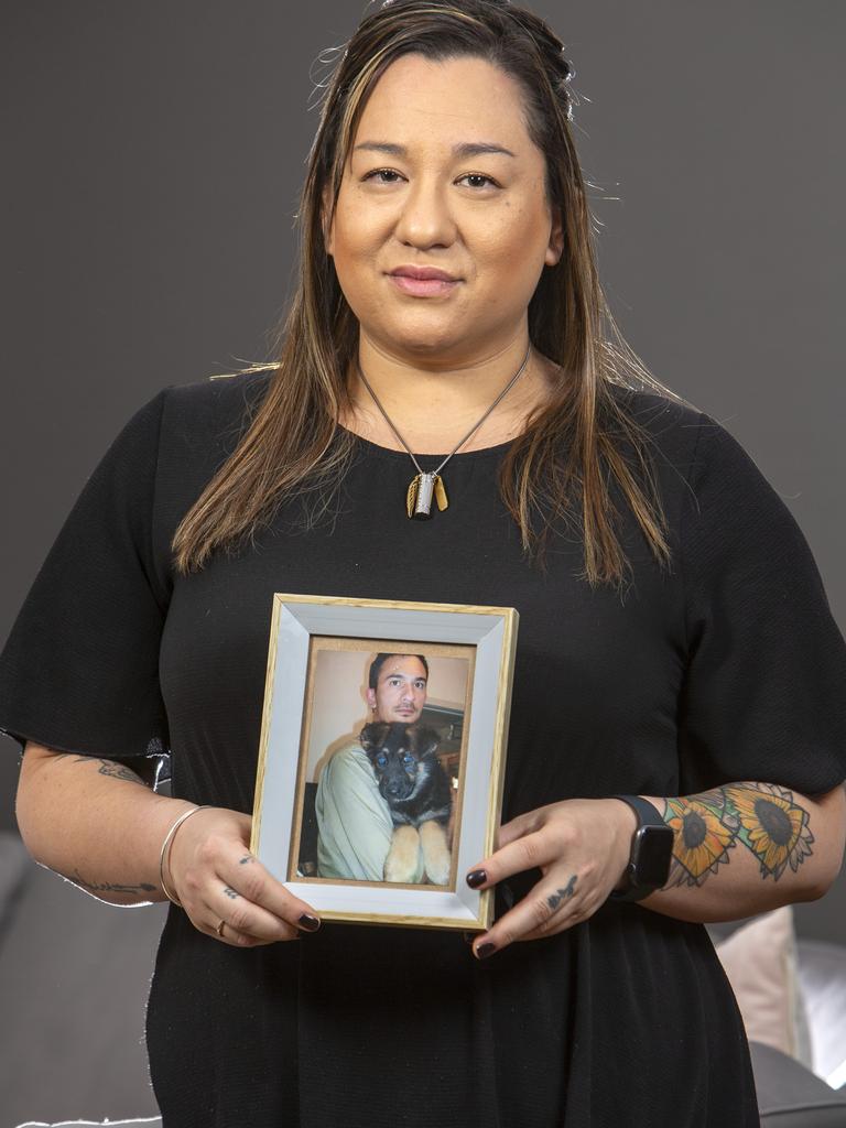 Mel Mountstephen at home with a framed image of her brother Jason Edward Mountstephen. Picture: Emma Brasier