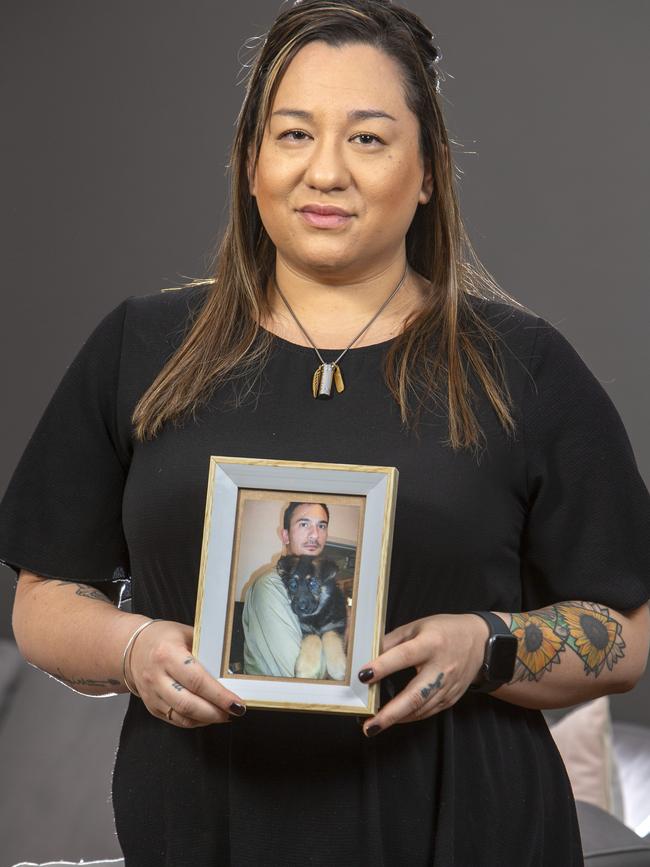 Mel Mountstephen at home with a framed image of her brother Jason Edward Mountstephen. Picture: Emma Brasier