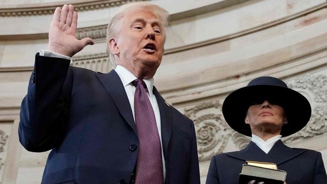 Donald Trump is sworn in as the 47th president of the United States as Melania Trump holds his Bibles. Picture: Picture: AFP