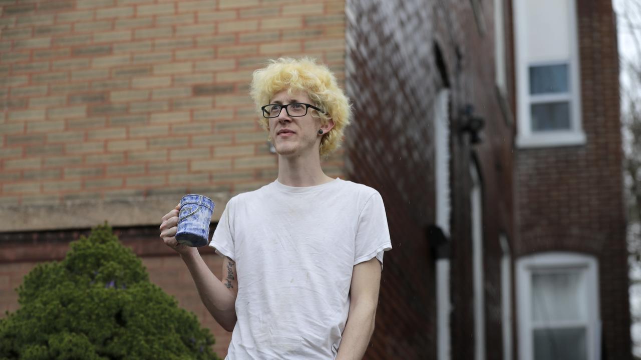 Kyle Kofron poses for a photo outside his home in St Louis, the USA, where people are also struggling to pay rent after job losses. Picture: Jeff Roberson/AP